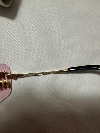 Gafas de sol Miu Miu rosas y doradas