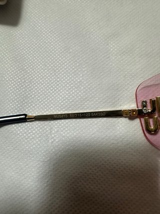Gafas de sol Miu Miu rosas y doradas