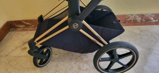 Silla de paseo  Cybex negra y dorada