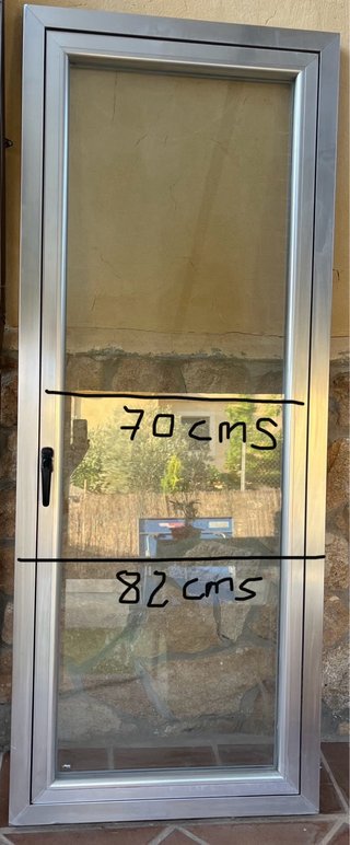 Puerta aluminio/cristal Climalit rotura puente tér