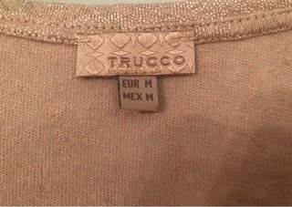 Camiseta dorada de Trucco
