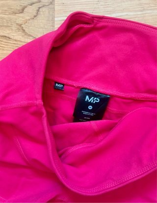 Conjunto deportivo Myprotein rosa