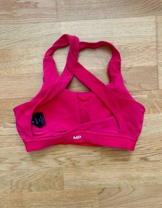 Conjunto deportivo Myprotein rosa
