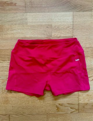 Conjunto deportivo Myprotein rosa