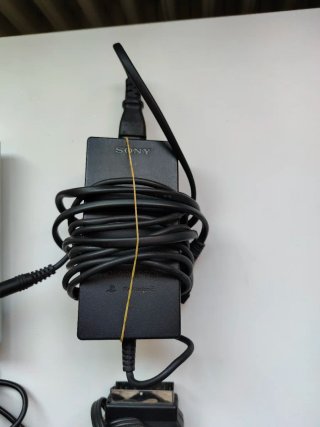 PlayStation 2 Slim Plateada + Accesorios