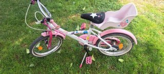 Bicicleta infantil rosa con cesta
