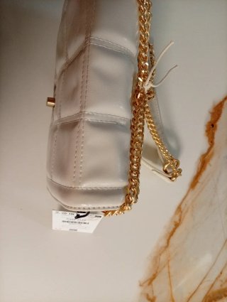 Bolso pequeño cruzado blanco y dorado