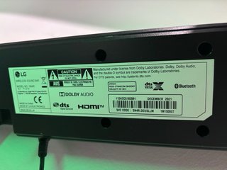 Barra de Sonido LG SN4R y altavoz grande