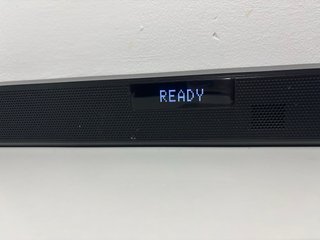 Barra de Sonido LG SN4R y altavoz grande