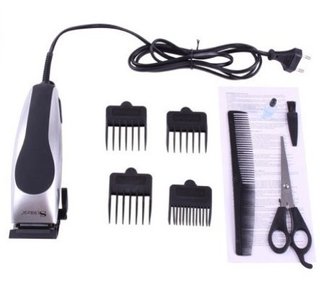 Máquina cortapelo con accesorios