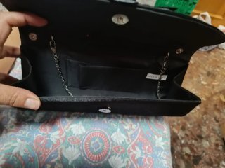 Bolso de fiesta negro con flor