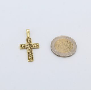 Cruz de oro de 18k. Peso: 4.11 gr.