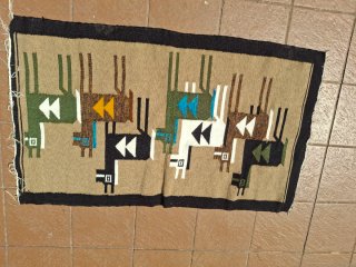 Alfombra de lana con diseño de animales