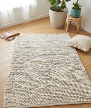 Alfombra de lana beige