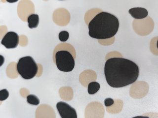 Falda midi estampado lunares beige y negro