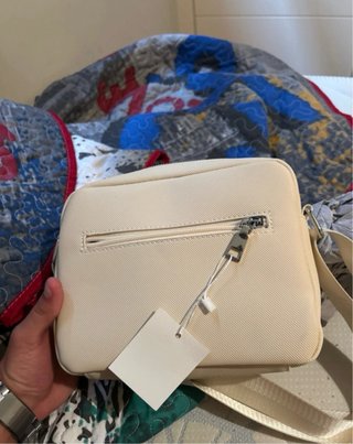 Bolso bandolera Lacoste beige