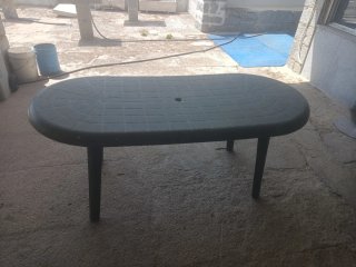 Mesa de jardín ovalada de plástico