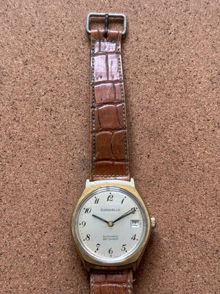 Reloj Caravelle Set-O-Matic Automático Dorado