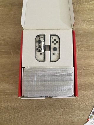 Nintendo Switch OLED + Assassin's Creed Ezio nuevo