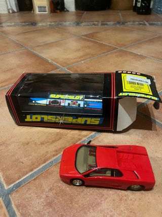 Coche Scalextric rojo superslot