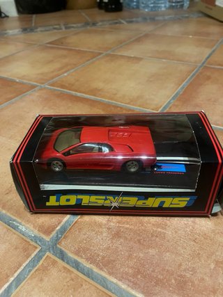 Coche Scalextric rojo superslot