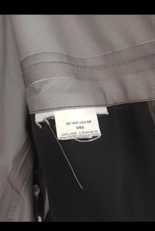 Impermeable Quechua Talla L gris