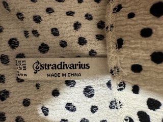 Falda corta lunares beige y negro