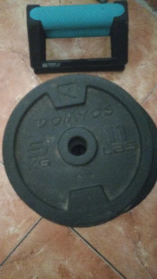 Discos de pesas DOMYOS 5 kg y 10 lbs