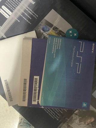 Caja PSP Slim & Lite con manuales