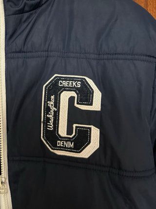 Chaqueta Creeks acolchada azul con capucha