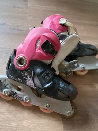 Patinetes en línea Oxelo rosas y negros