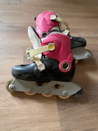 Patinetes en línea Oxelo rosas y negros