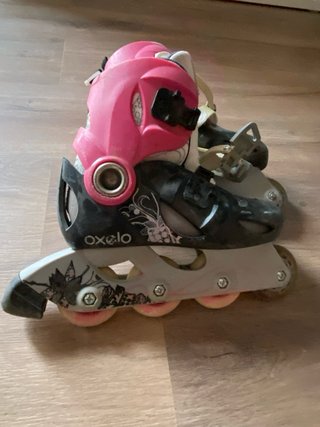 Patinetes en línea Oxelo rosas y negros