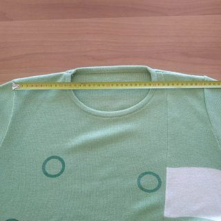 Maglione verde con inserti bianchi