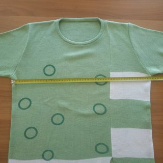 Maglione verde con inserti bianchi