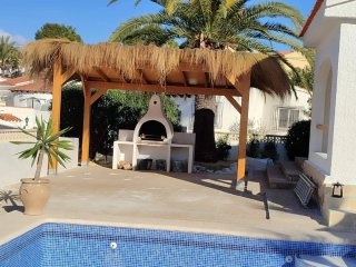 Sombrilla y Pérgola de Madera y Tela
