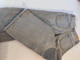 Pantalones vaqueros niña grises