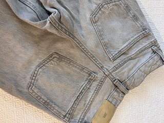 Pantalones vaqueros niña grises