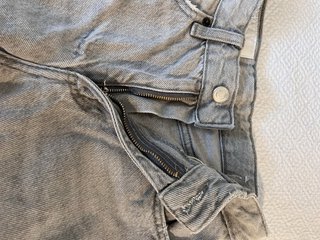 Pantalones vaqueros niña grises