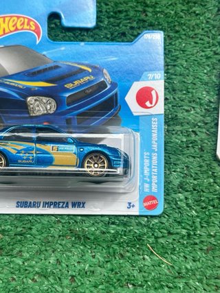 Hot Wheels Subaru Impreza WRX y Ferrari SF90