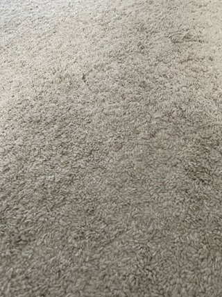 Alfombra redonda beige y gris