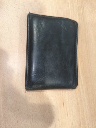 Cartera de piel negra hombre