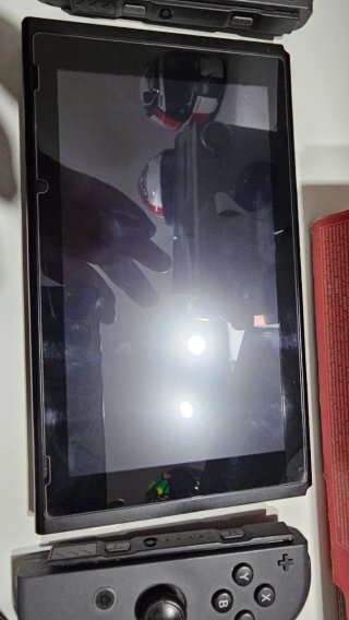 Nintendo Switch Completa Negra y Roja