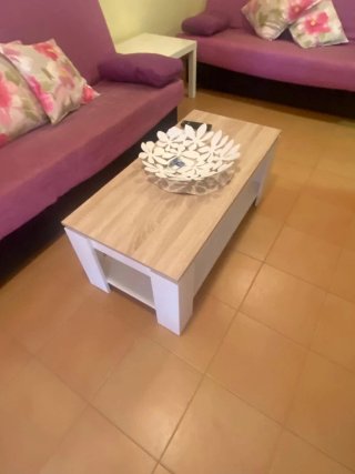 Mueble salón,mesa de delante sofá mesa redonda y s