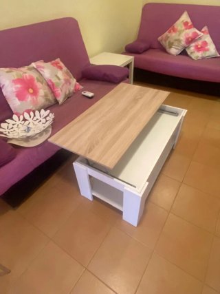 Mueble salón,mesa de delante sofá mesa redonda y s