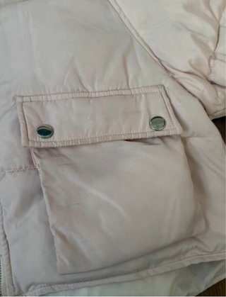 Abrigo rosa claro con capucha