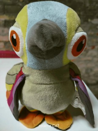 Peluche de pájaro multicolor con sonido