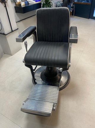 Sillas de barbero para cambiar la bomba hidráulica