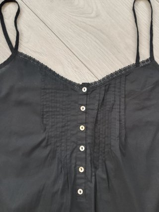 Blusa negra de algodón con dos texturas