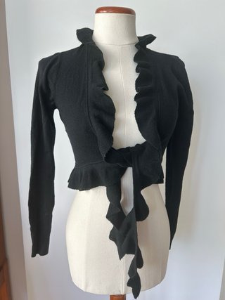Bolero negro con volantes